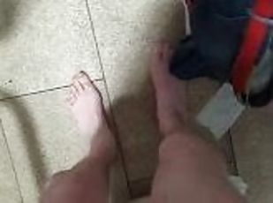 Stripping completely naked and jerking off in public bathroom