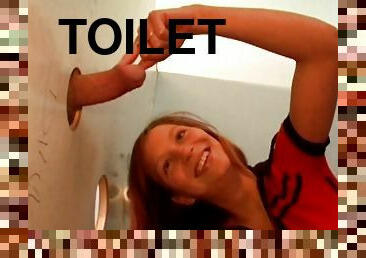 Redhead having sex in the toilet