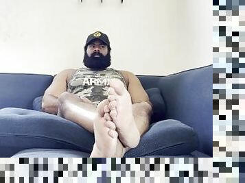 Muscle Bear showing his massive feet