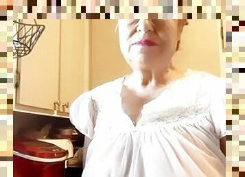 Mature woman in sheer granny nightgown, natural tits