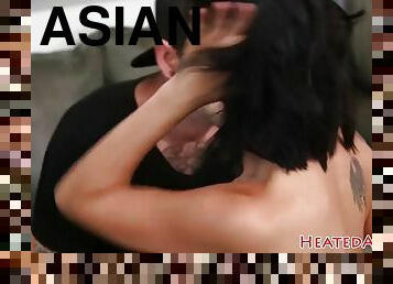 Inked asian babe gets fucked in hairy pussy