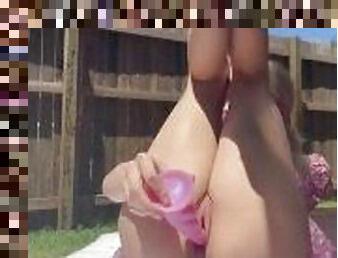 Blonde slut Bree Louise fucking herself with a dildo outside