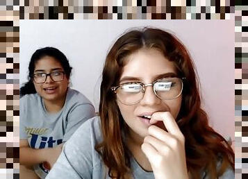 Two nerdy latinas playing with their pussies on cam