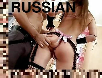 Russian slut in lingerie has her pussy and ass fucked hard