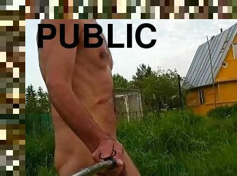 Naked Exhibitionist walks in the evening in the village