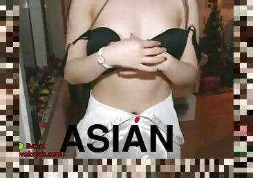 Asian teen camgirl in uniform sexy striptease