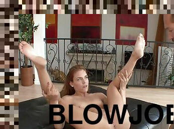 Cute redhead Daisy Dalton is giving a blowjob