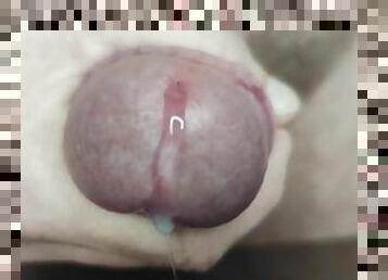 Close-up handjob foreskin precum and cum