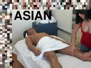 Asian masseuse gives a client more than just a massage