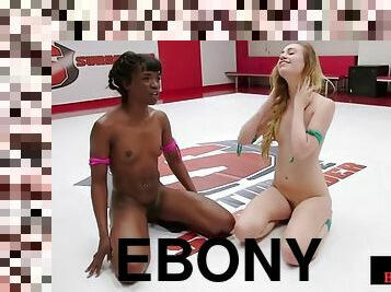 Ebony wrestling lesbian dominates loser with strap-on