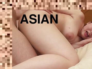 Succulent Asian MILF pleasures her horny husband in bed