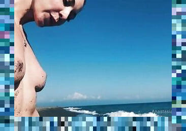 Horny teen girl looking for fuck on wild beach. Masturbation in public.
