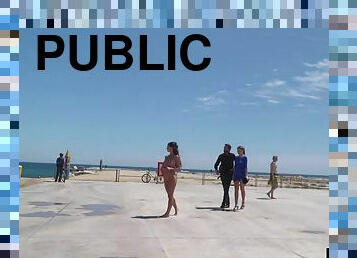 Public euro walks and crawls outdoors in front of strangers