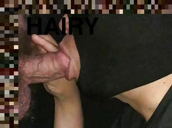 Hairy cock through glory hole