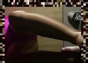 Footjob in shiny pantyhose and pink spandex swimsuit