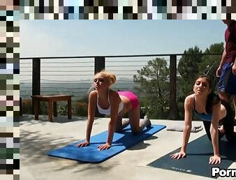 Naughty teens fuck their yoga instructor in a threesome