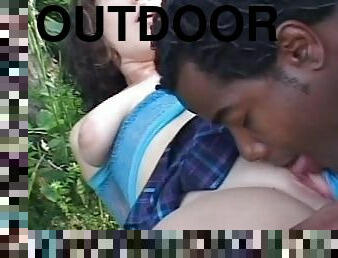 Awesome interracial scene in the garden