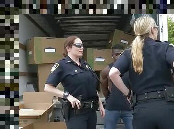 Black homie fucks two police sluts in a truck to avoid incarceration