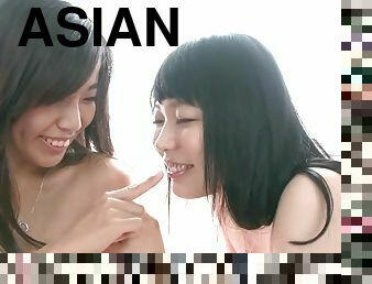 Two adorable Asian ladies can't get enough of each other