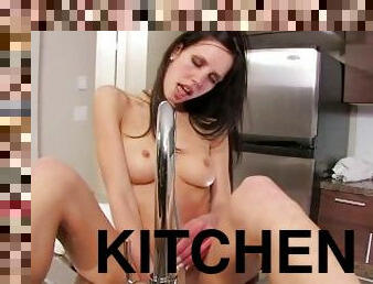 Petite Brunette Pleases Her Tight Cunt With A Water Faucet In The Kitchen