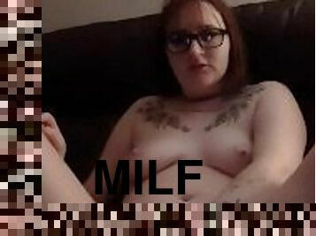 Redheaded milf fucking herself with big dildo