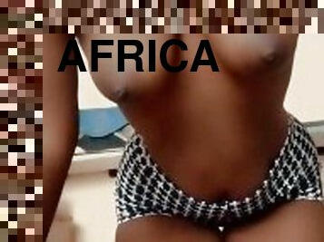 Topless Bald African girl seduction showing titties