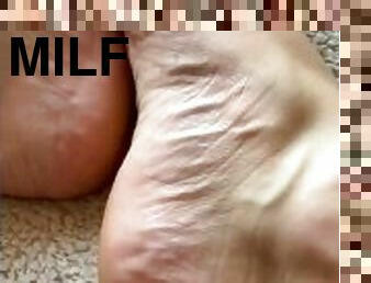 Milf showing off her sexy, mature high arched feet
