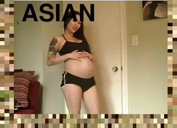 Pregnant asian belly