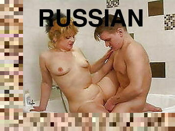 Elegant Russian mommy with her young lover