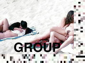 Group sex on a German beach, upscaled to 4K