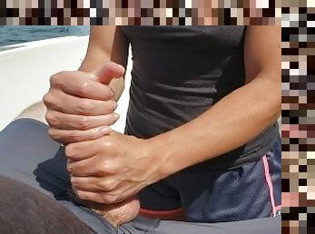 Relaxing on the back deck and busting a handjob nut on the open seas.
