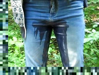 Sexy peeing jeans on public place