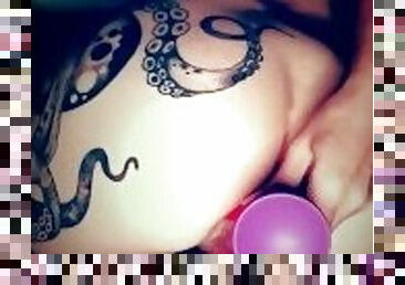 Close-up anal solo girl playing with big ass octopus tattoo