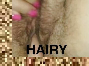 Fingering hairy pussy