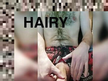 Hairy guy showing off and playing with his cock.