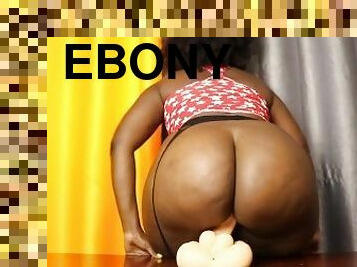 Big ass ebony girl fucking a white  dildo