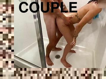Young couple gets into steamy action-shower sex