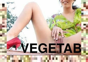 Shameless nature walks around with vegetables in her pussy