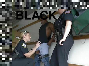 Raunchy female cops fuck black thug