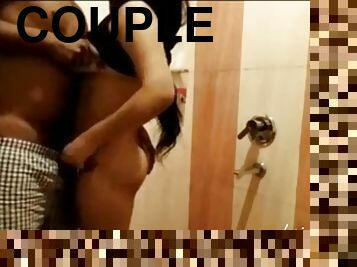 College couple having fun in the bathroom