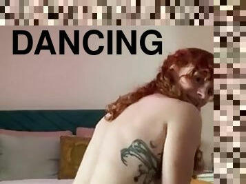 Hot redhead dancing