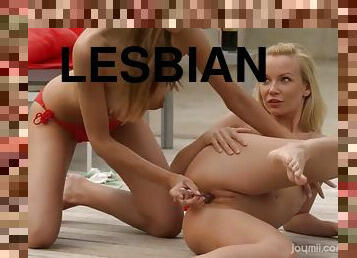 Lesbian couple playing with each other