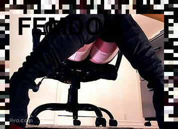 Femdom has a slave locked under her desk