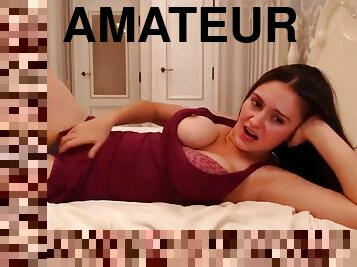 Sexy brunette striptease and masturbates