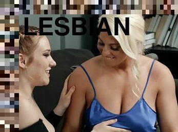 Buxom lesbians Paris Knight and Daisy Lynne are licking off next to sleeping guy