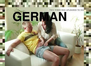 German stepmom surprises her stepson in crotchless jeans and fucks