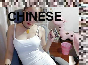 Chinese cam girl spits and foot teasing