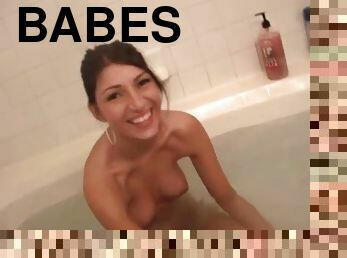 Beautiful teenager washes up in the bathtub