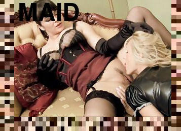 Dirty maid gets on her knees to lick her pussy mistress