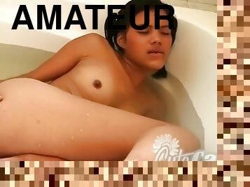 Cute masturbating teen enjoys her bath